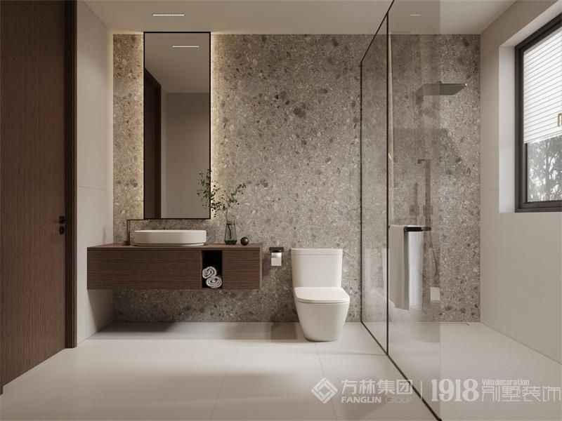 岩板墙的运用使卫生间更具现代感和高端品质。这样的设计不仅提升了卫生间的美观度，还具备了实用性和耐久性。