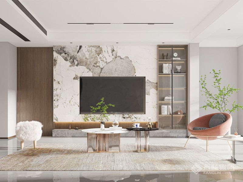 客厅的线条干净、利落，电视墙是素白色，下方内凹设计，能做简易收纳。