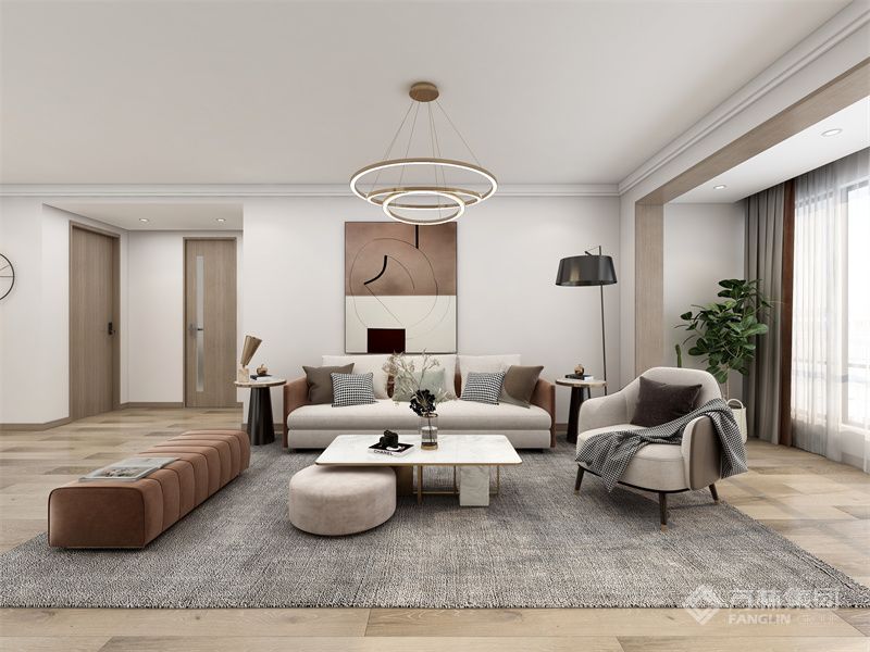 整个客厅没有复杂的装饰，仅用简单的家具与绿植便让客厅充满生机与质感。业主家选择的是全屋通铺地板，一体化统一带来视觉上的无限延展。纯白墙面一丝不苟，一幅亚麻质感的挂画自带肌理，打破白墙的寡淡。自由组合的