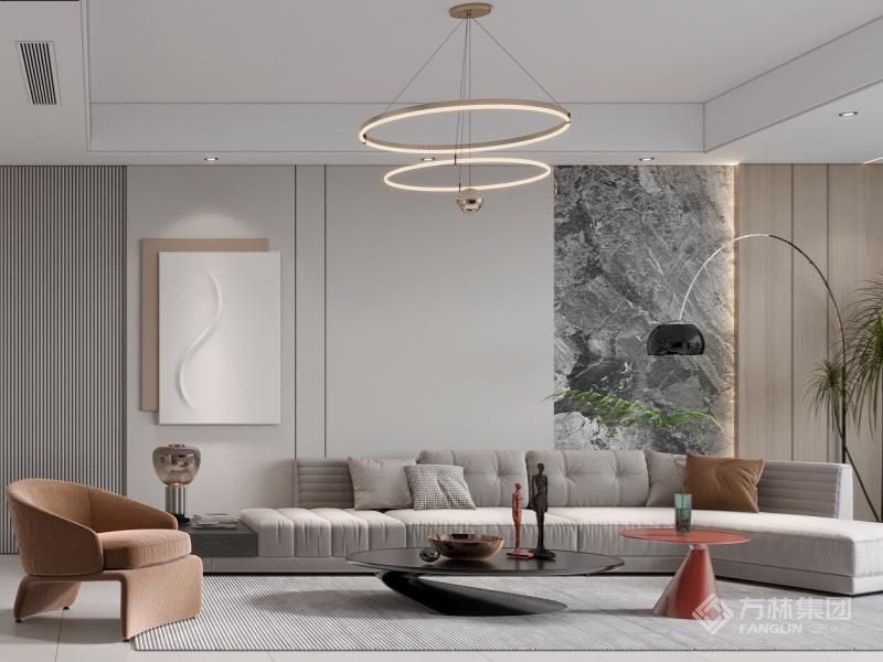 客厅整体边吊，电视背景墙采用了柜体来做，储物空间拉满。沙发墙用到了岩板和墙板的结合。整体色调明快。